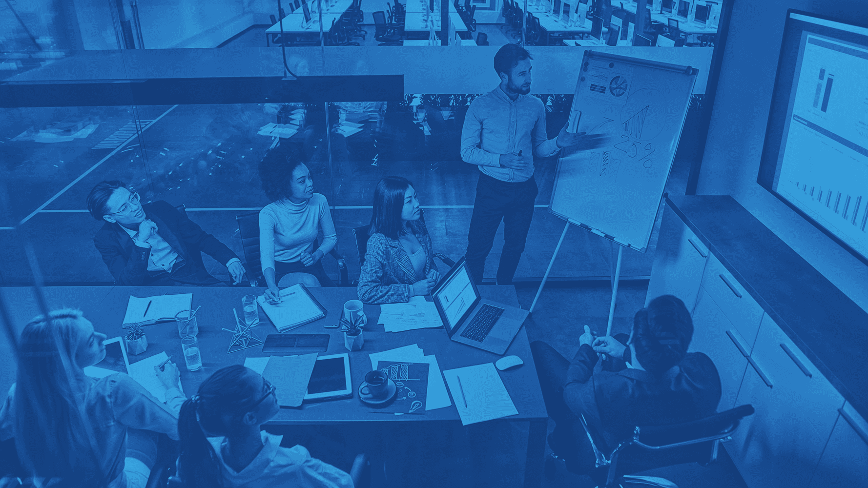 office meeting with presentation planning logistics