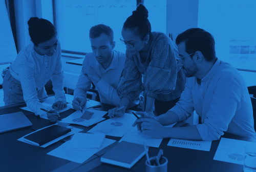 business meeting planning next steps with charts